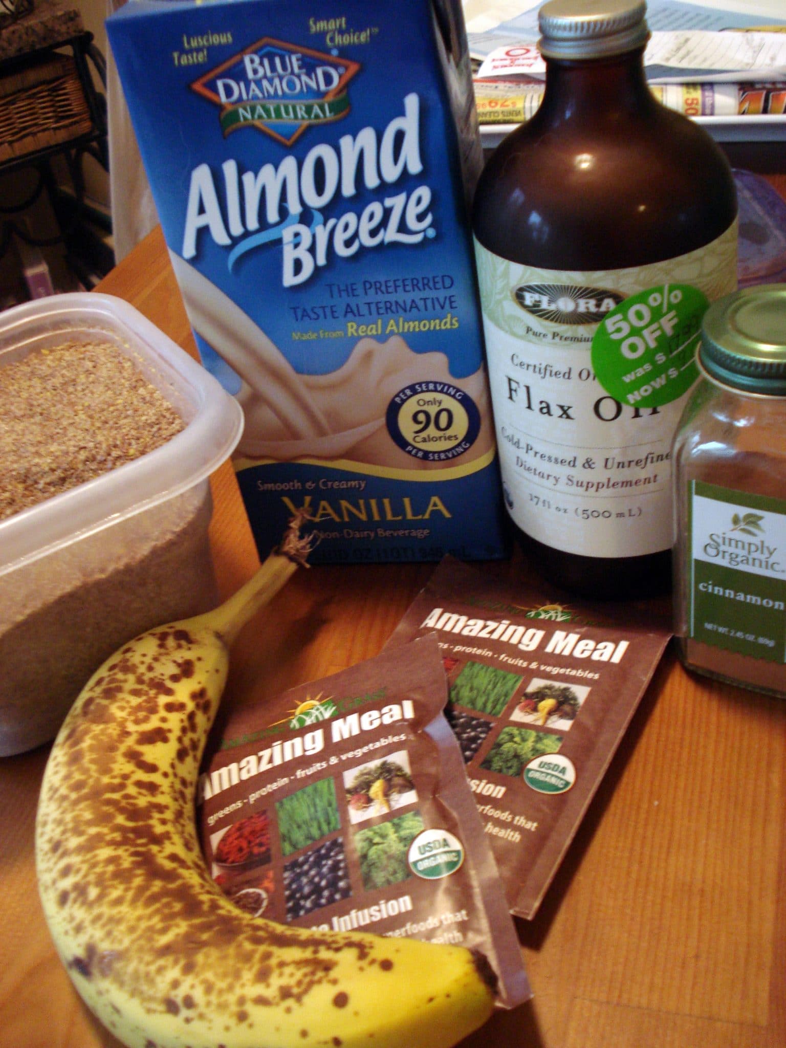 Ingredients for "Amazing Meal" Chocolate Smoothie; banana, flax oil, almond milk, amazing meal packet