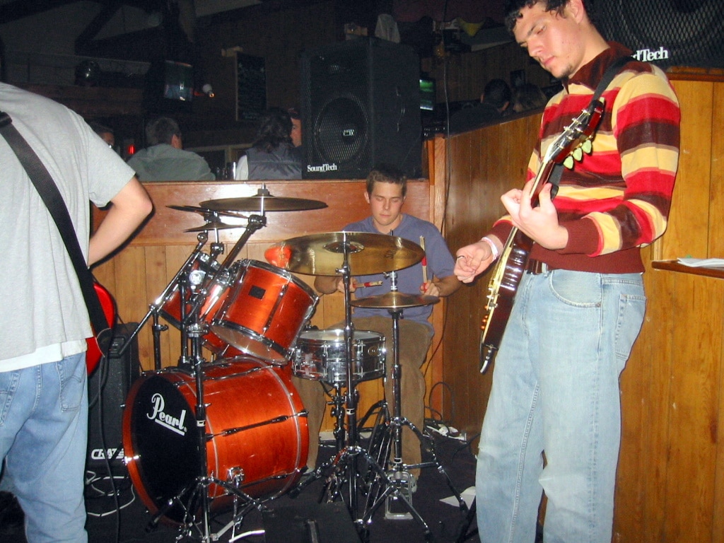 Matt playing drums in band