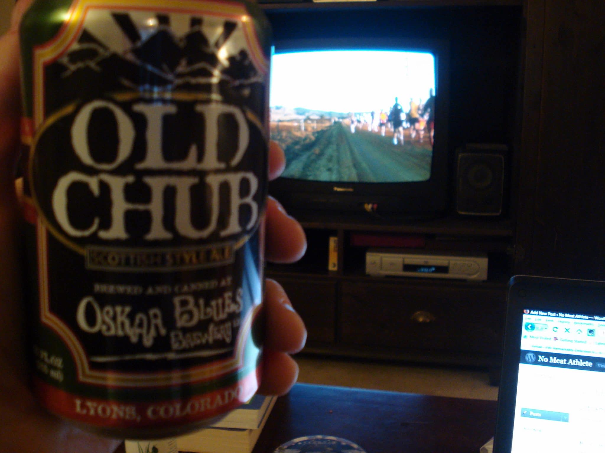 Matt drinking beer while watching Ultramarathon Man